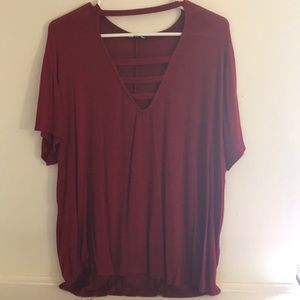 Red cut out shirt, in style!
